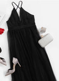 Beautiplex front slit tulle dress.